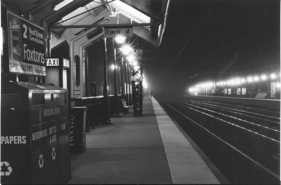 guy in the distance at the train station