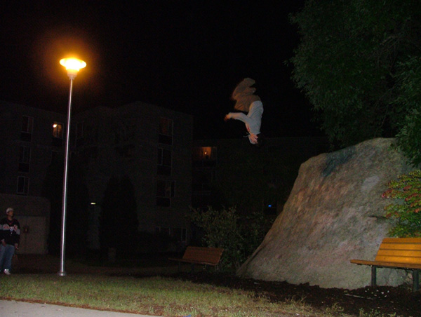 Huge backflip 180 off 9ft rock