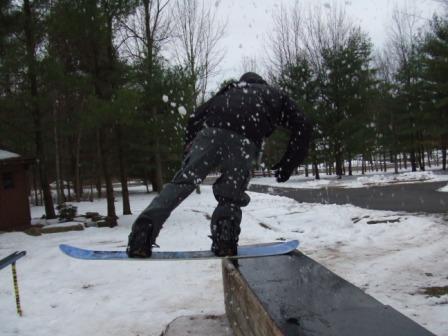 i ski but here's me trying a tail slide on a board