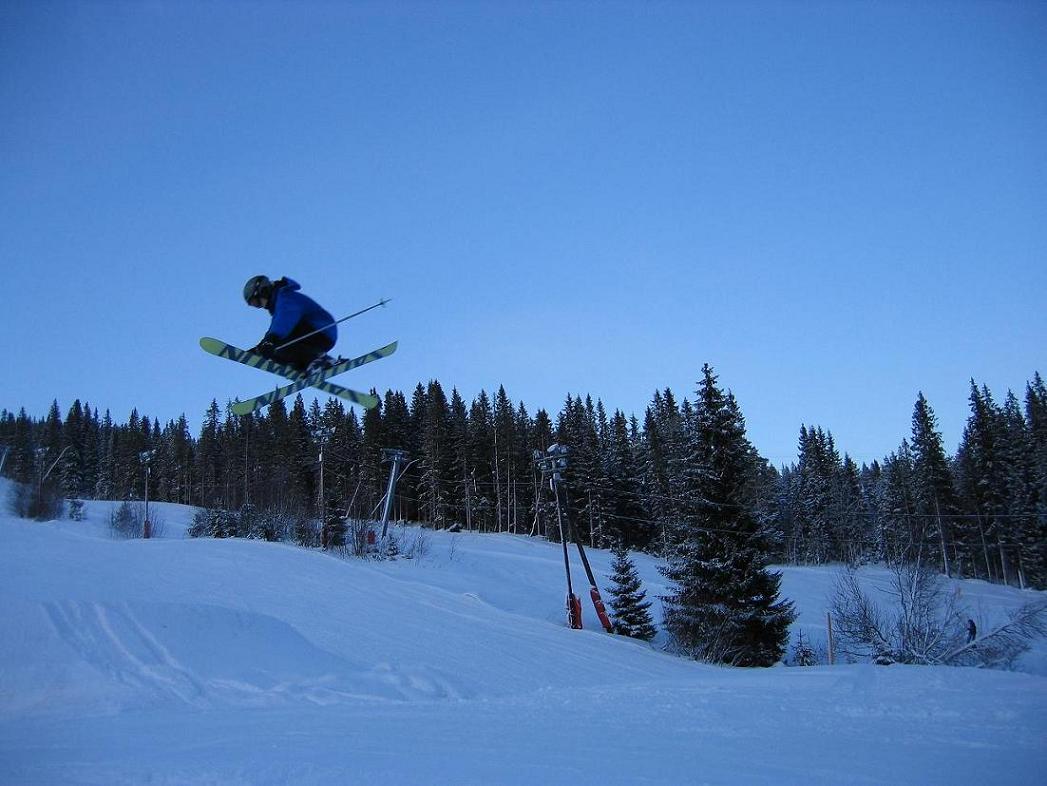It's a nosegrab 360 on our bigjump that has a flat on approximately 6 meters I think. :)