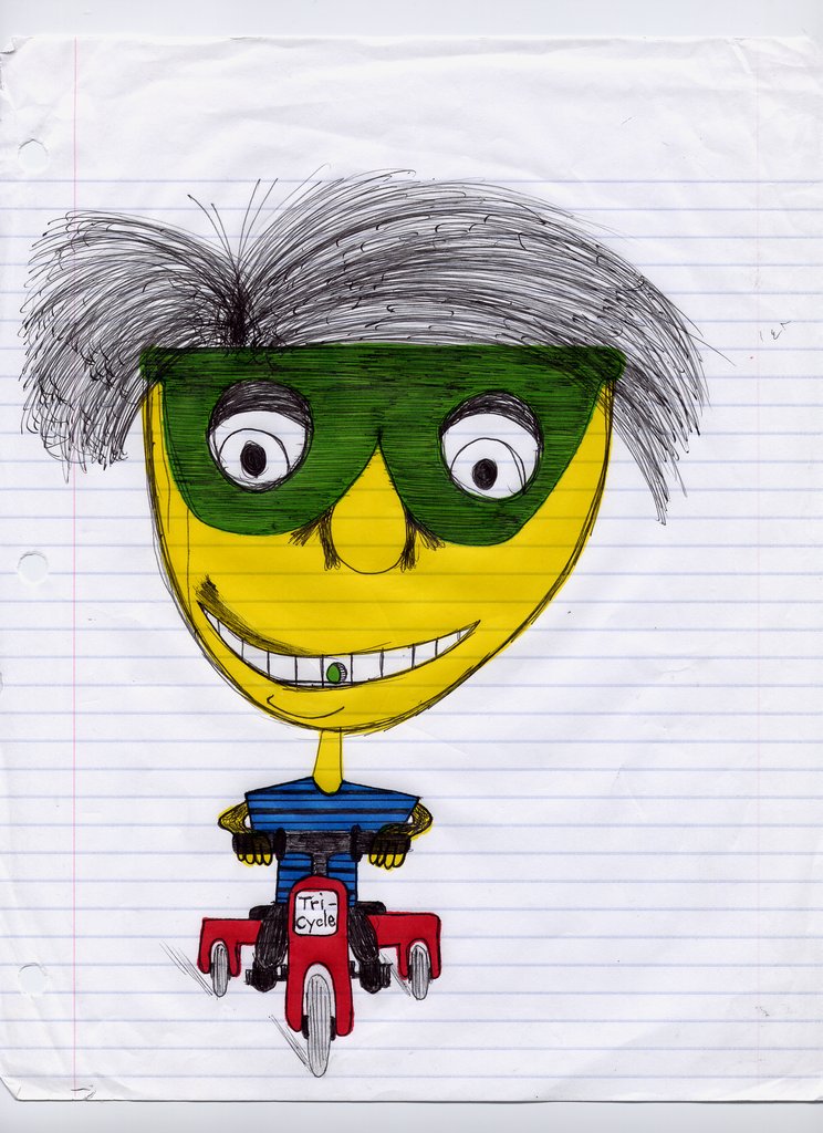 Kid Riding a Tricylcle