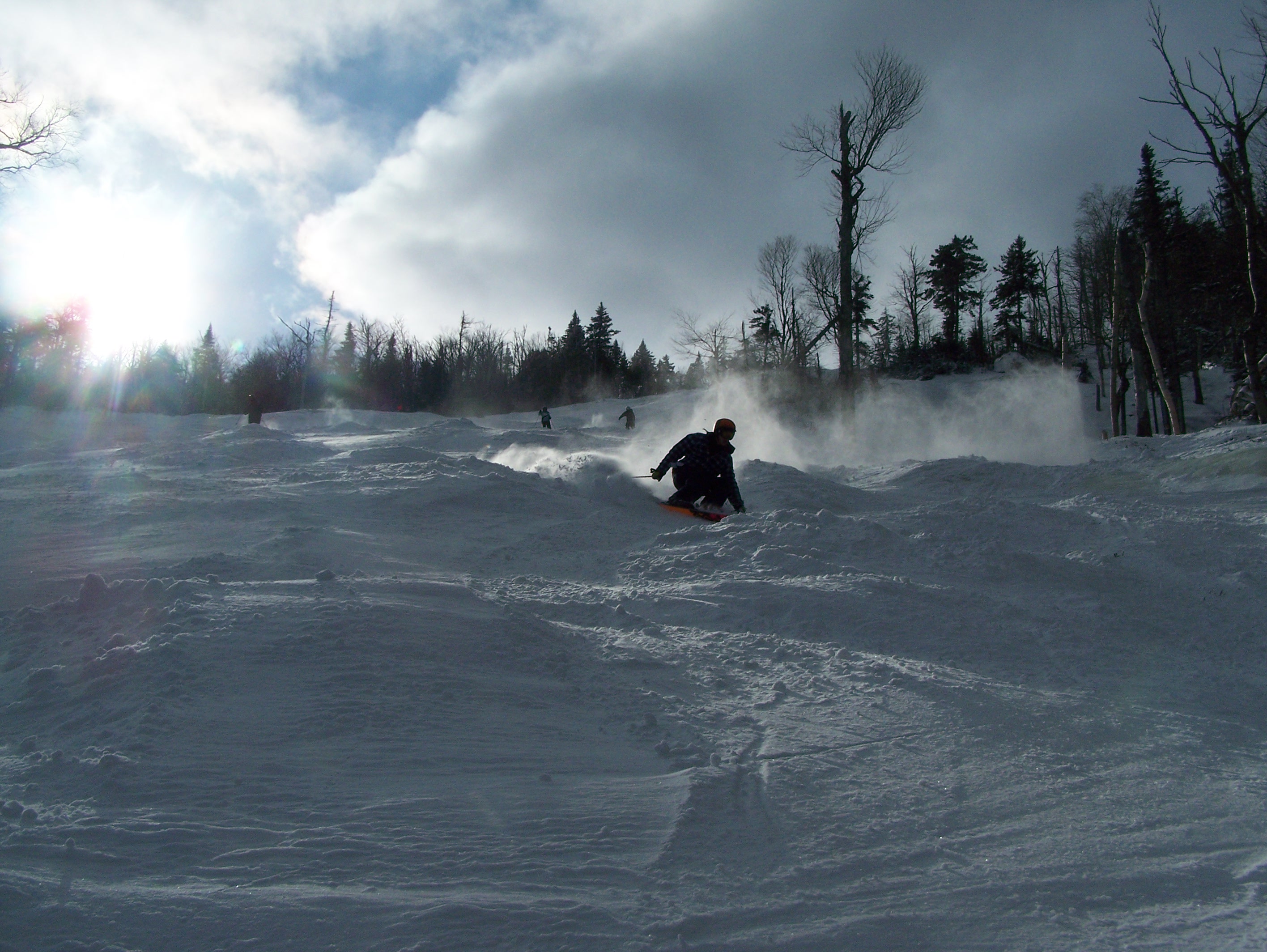 Landing backseat off a mogul