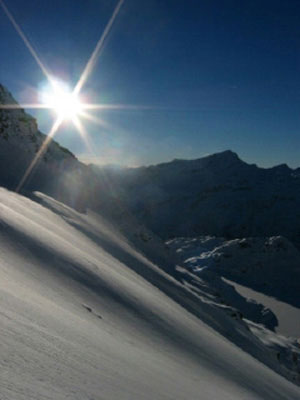 Looking into the sun at the slope we are about to ski