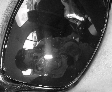 Me in the refleciton of my sisters sunglasses