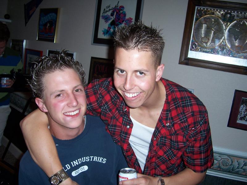 Me (right) and my bro with our Gotti hair