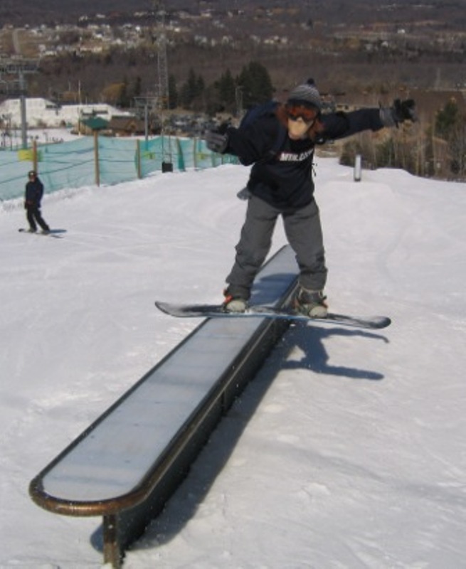 mike frontsiding the flat box.......with monkey mask on