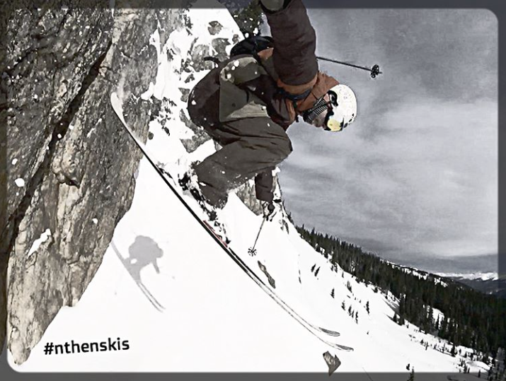 N Then Skis Sending A Nice Drop