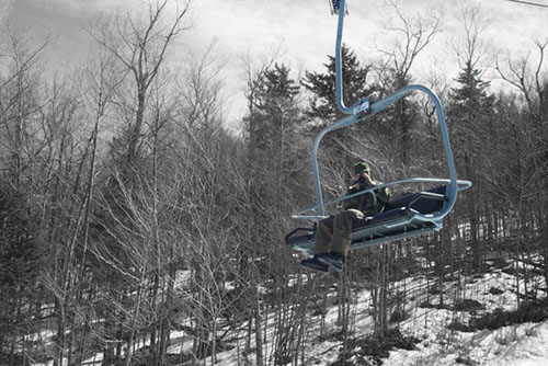 niel getting his bied eye view of the transfer via the lift