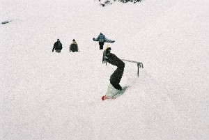 OUCH, Snowboarder gets axed!