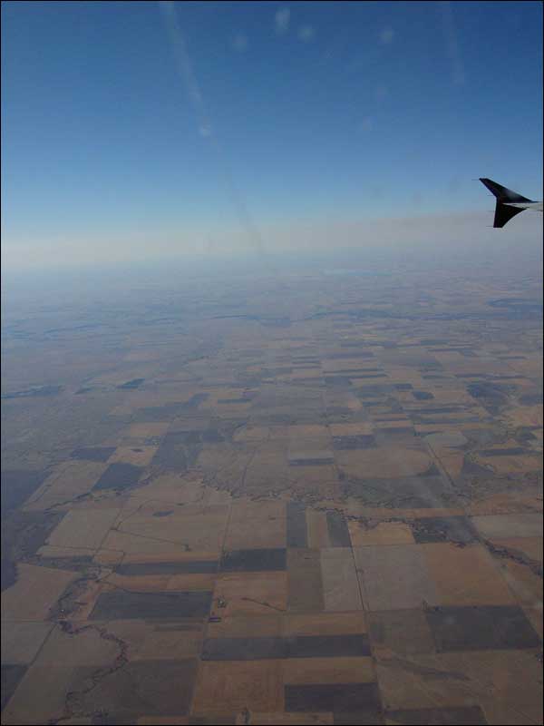 Out West- In Flight view of Manitoba, not a ski hill for thousands of miles...