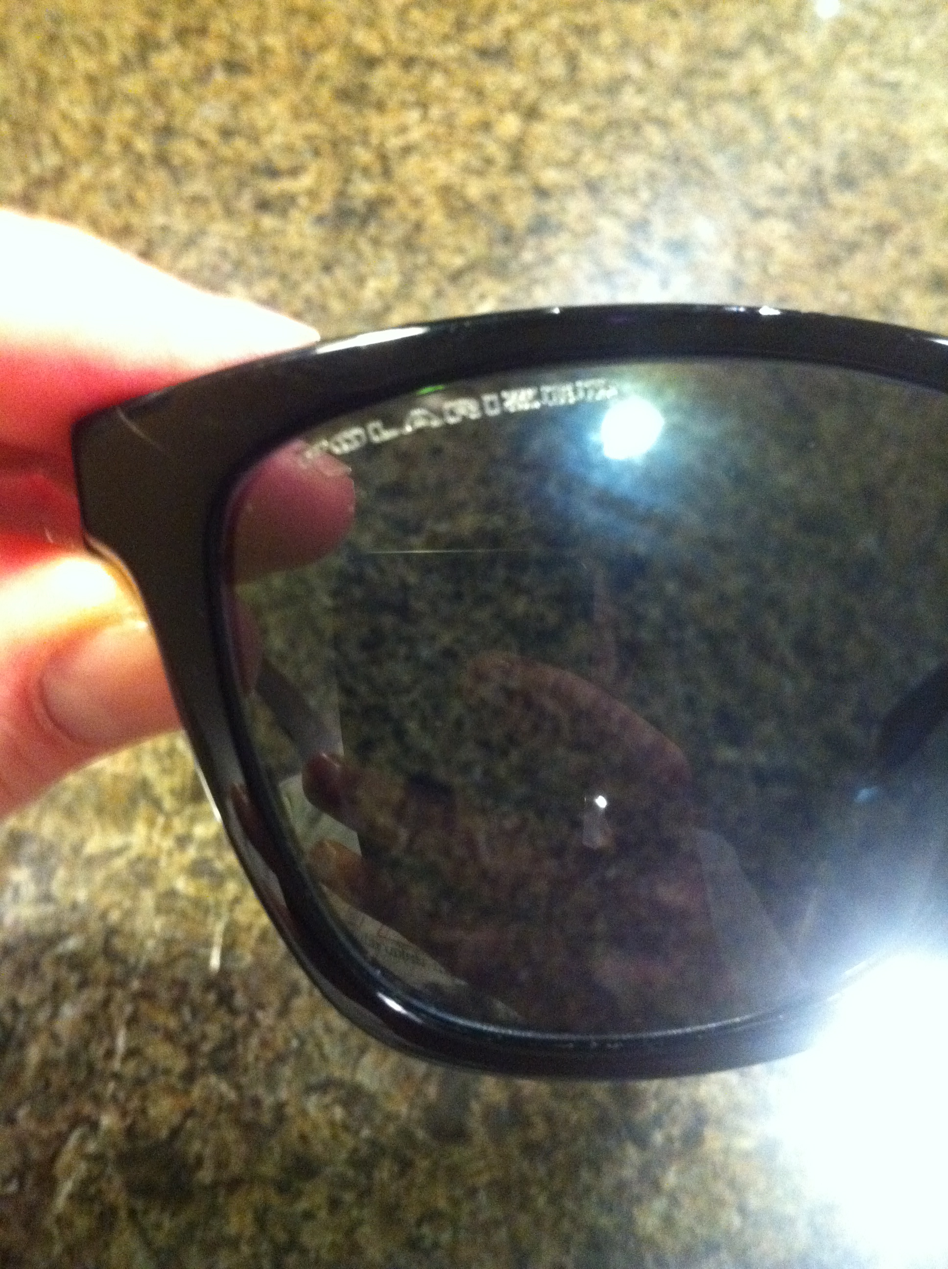 Polarized black frog
