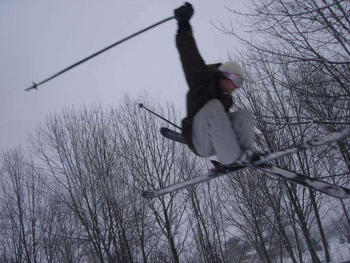 rich grabs his ski as the sky turns grey...