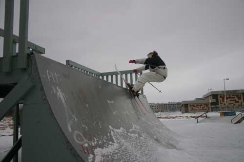 Riding an iced up mini-ramp.