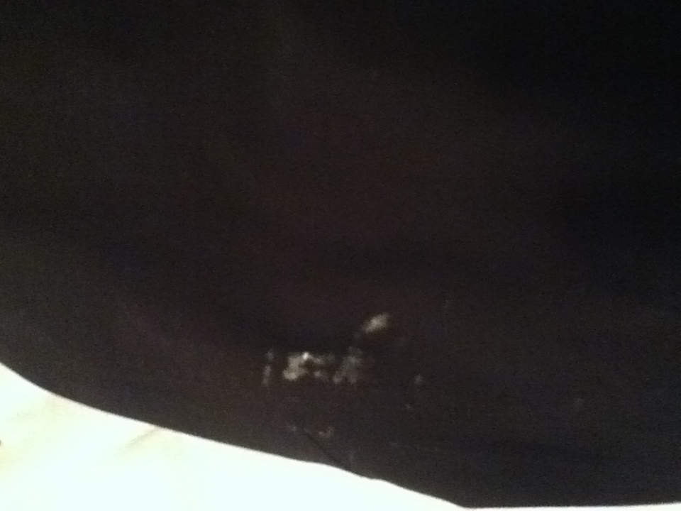 right elbow, slight smudge from rail, only cosmetic, hardly noticeable