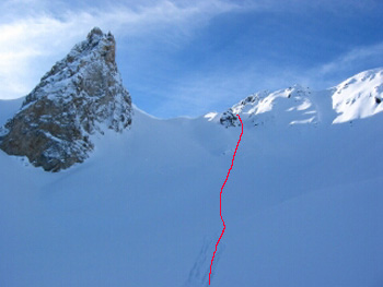 Showing my line through the small gully onto the open face. The snow was AWESOME thigh deep