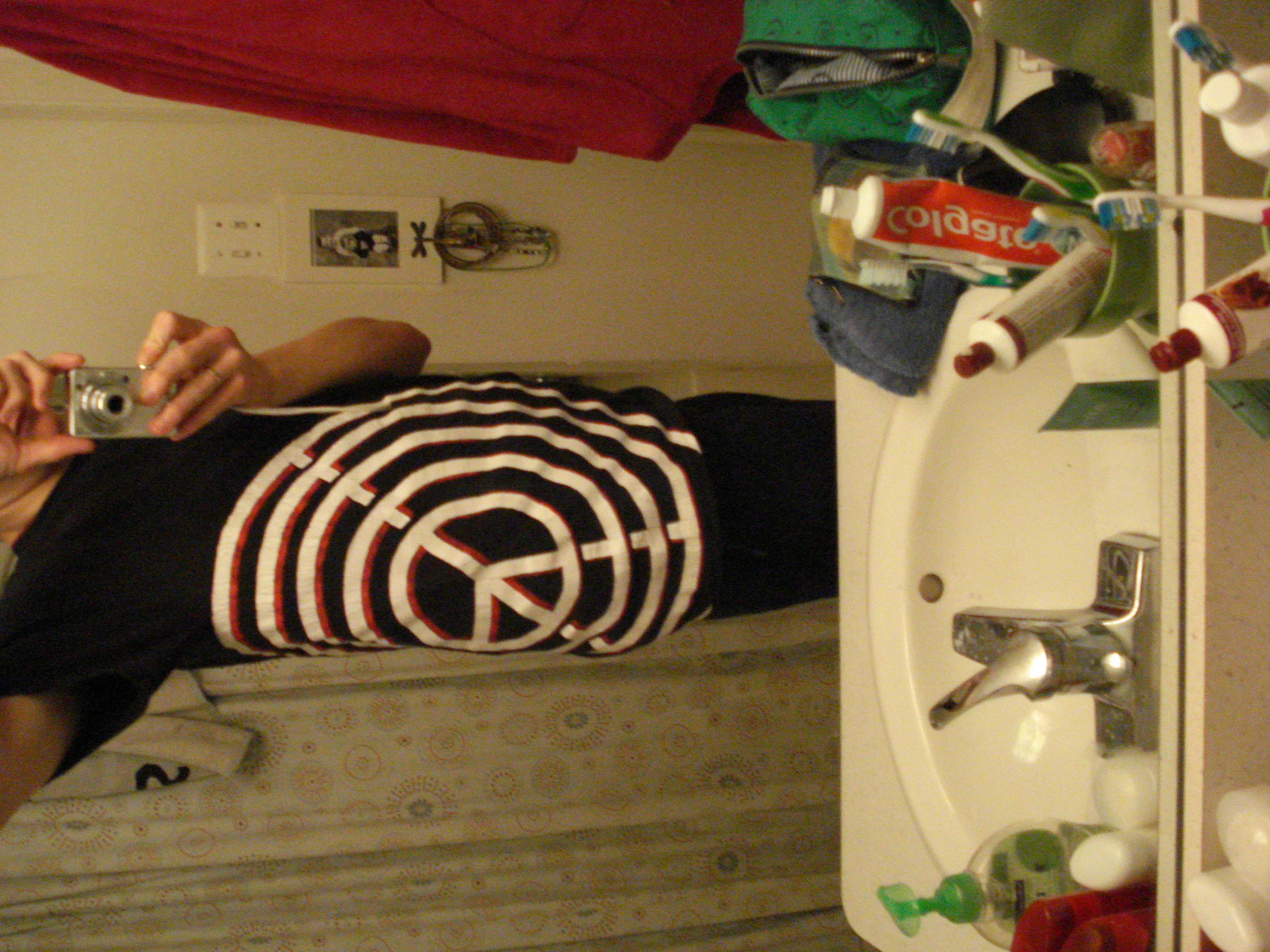 Side view of peace sign ripple tshirt