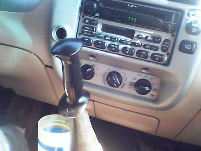 Ski pole handle shifter