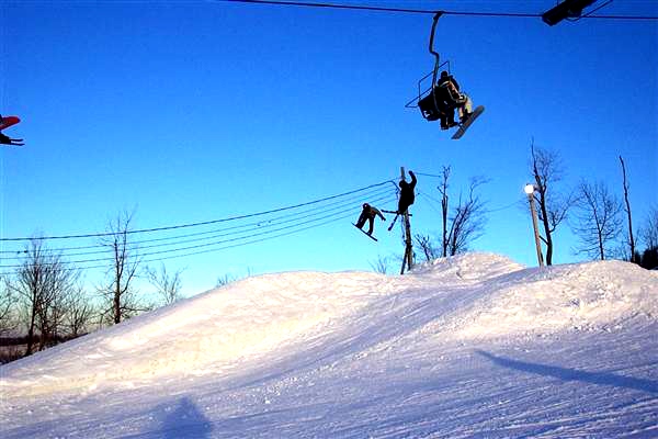skier and border at the same time
