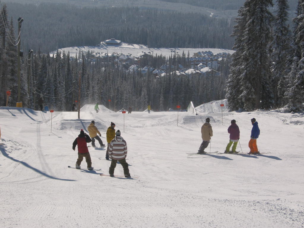 Skiers and boarders getting ready to drop in. Peace and harmony between clans!  Eh Jay.