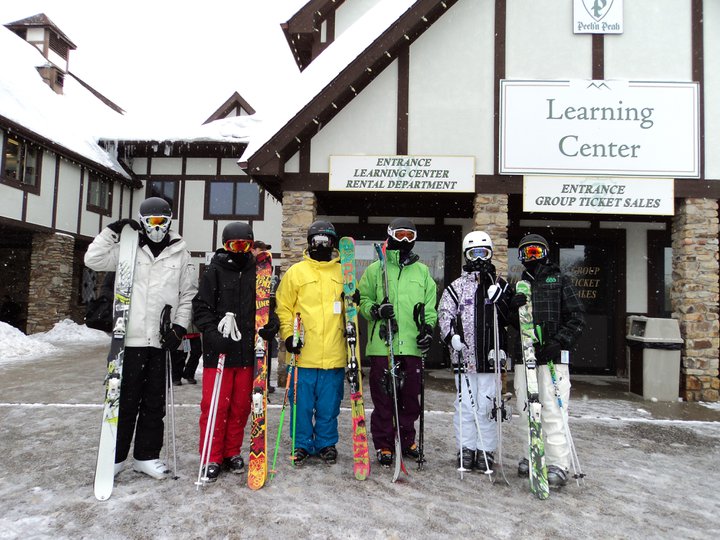 Skiers look like a bag of skittles