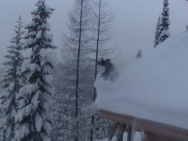 skiing off a rrof