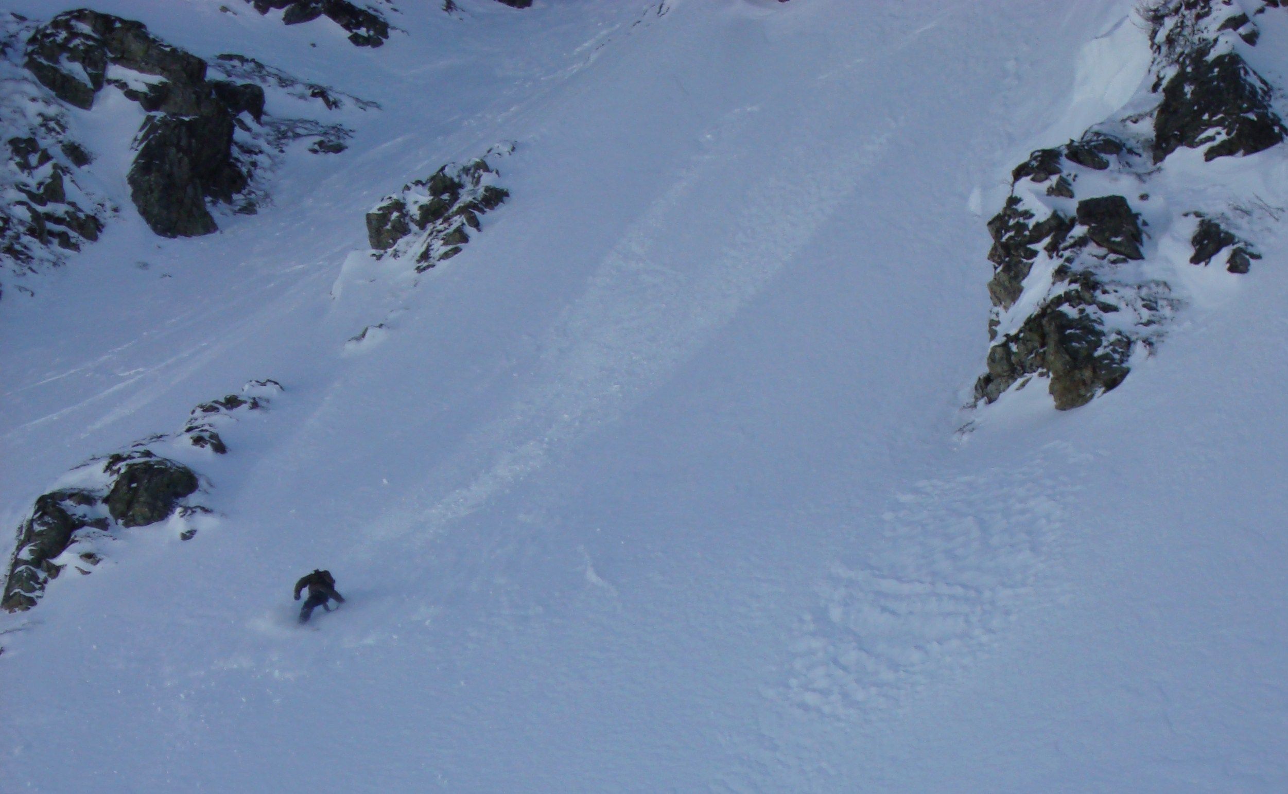 Skye Darden fakie riding in Arlberg back country