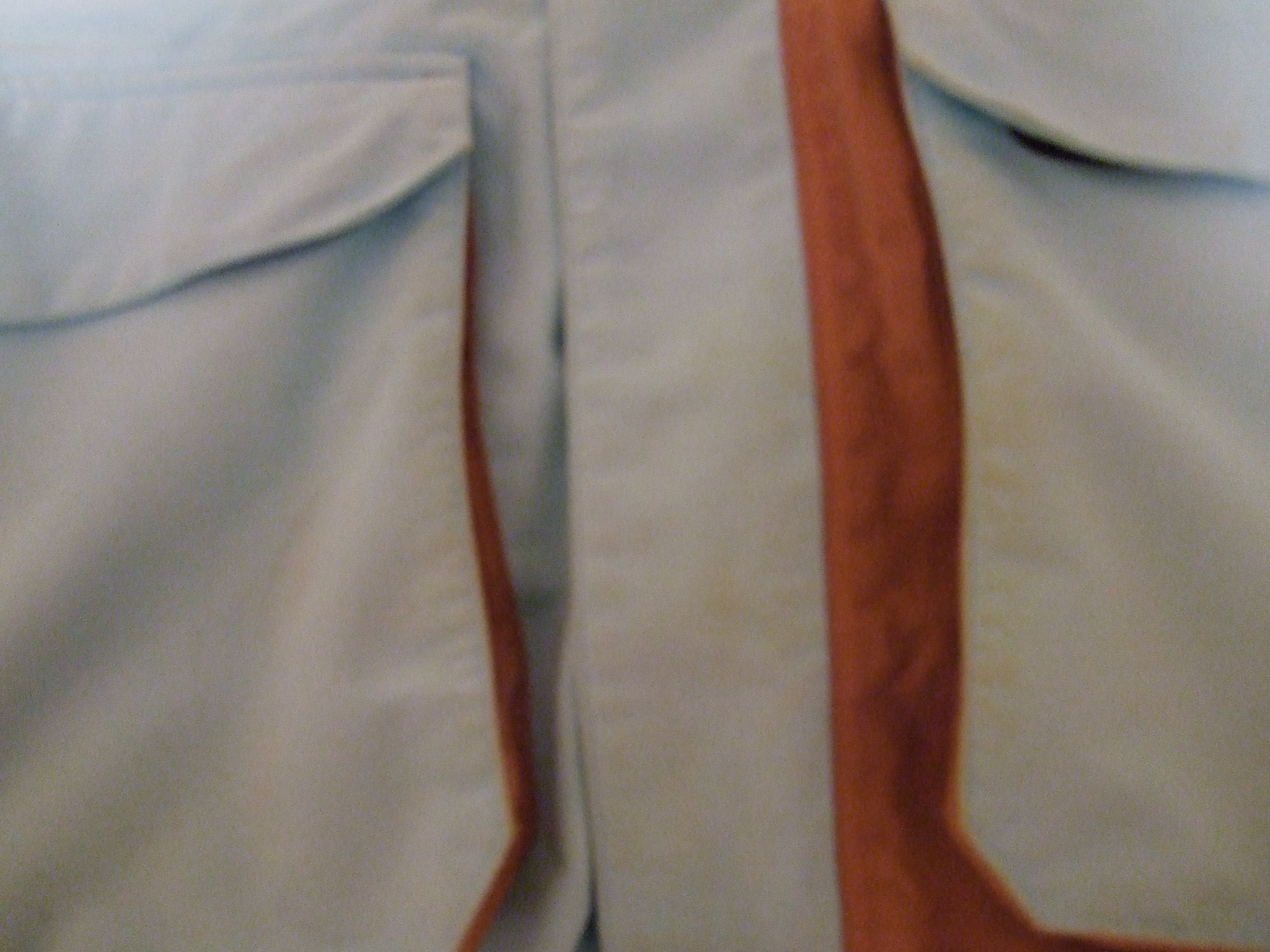 Slight staining on pockets and zipper