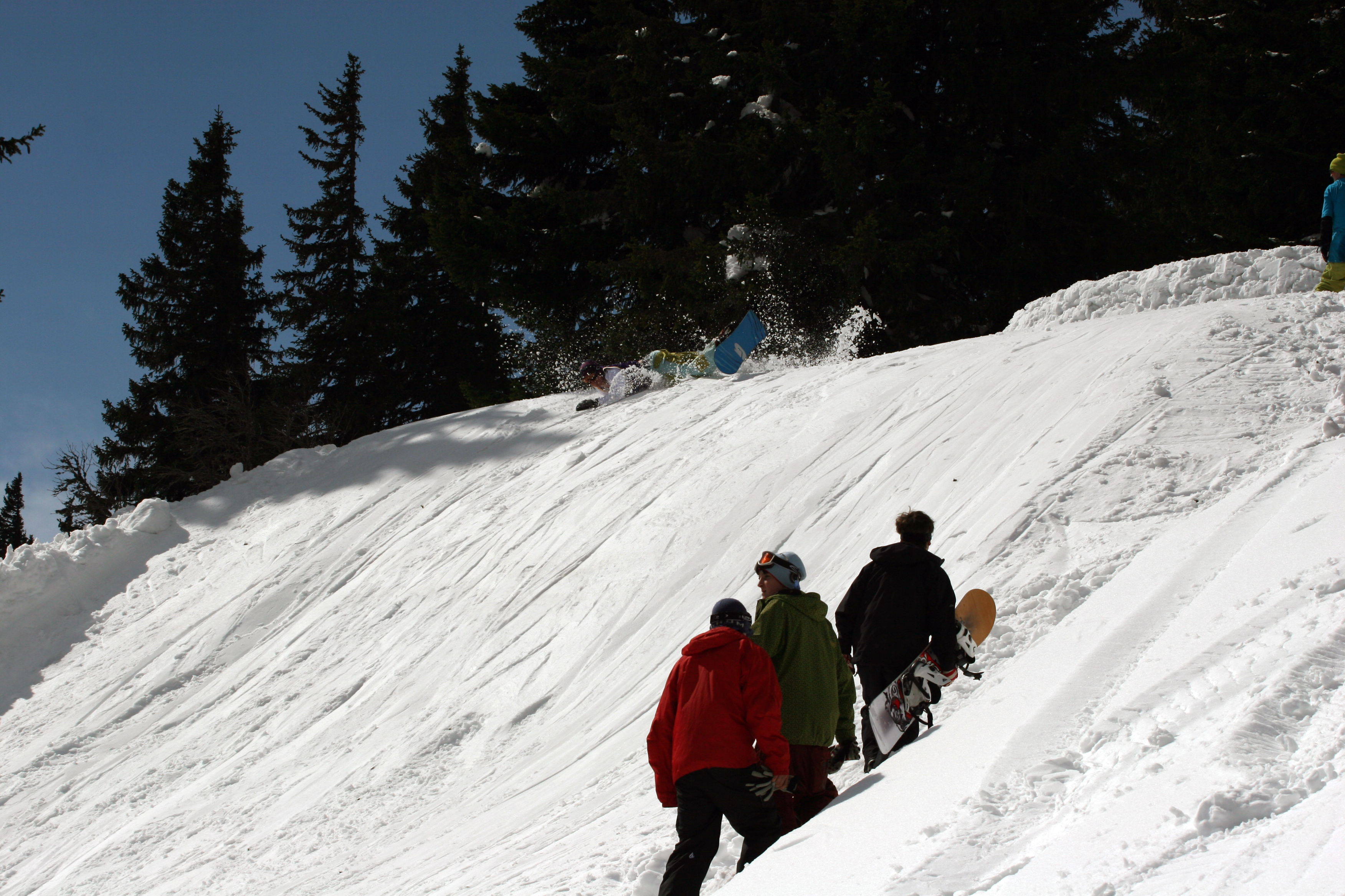 Snowboarder eating shit