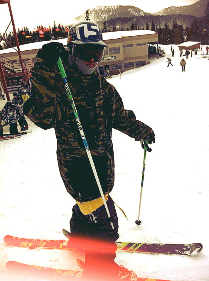 Snowboarder on skis