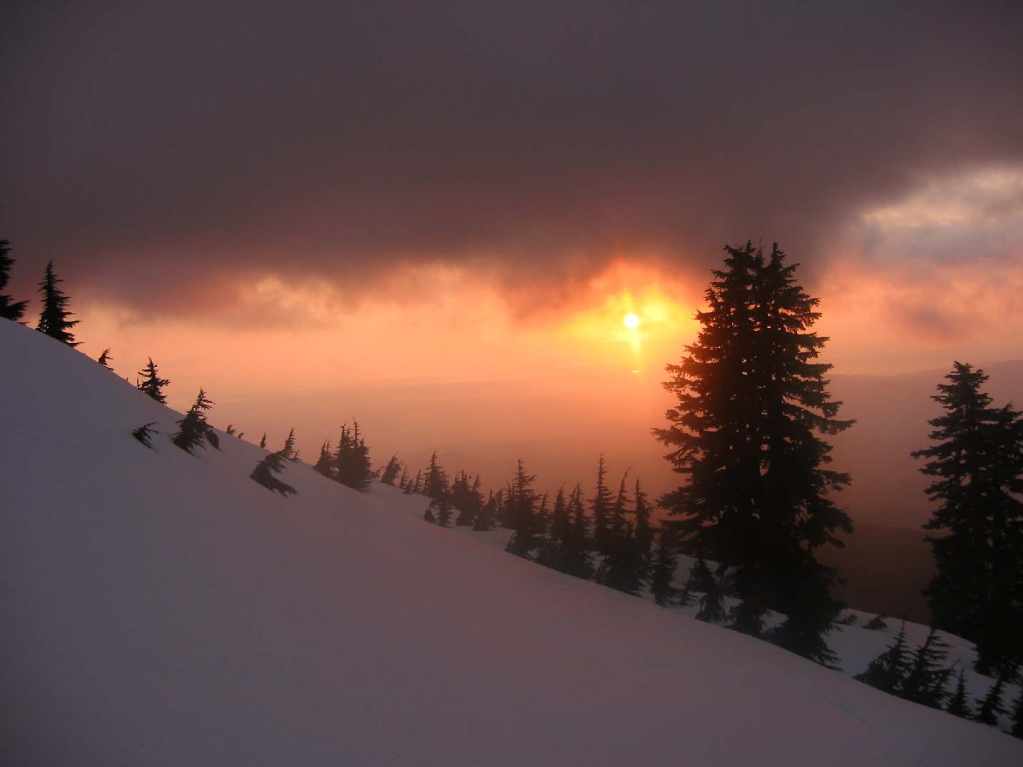 Storm clouds and Sunset on the Pill.