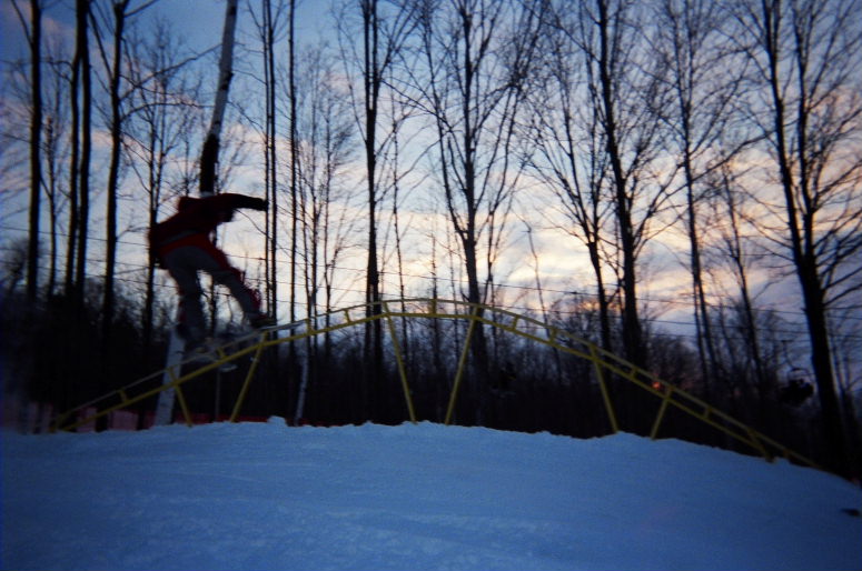sunset on a  rainbow rail