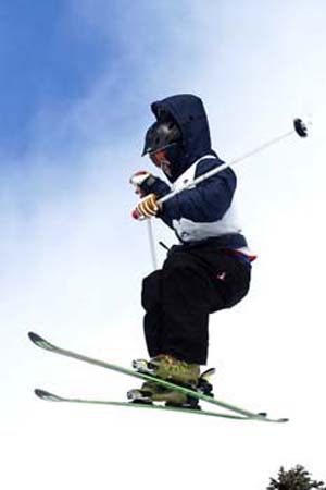 Super close shot before landing some trick. (I think a 900)