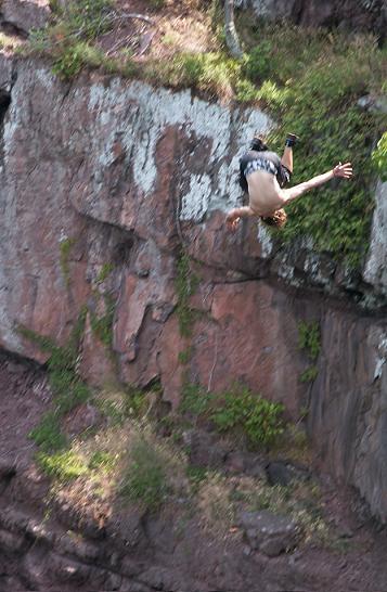 Superman late flip off cliff