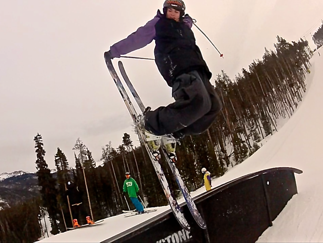 Tail grab toe slide