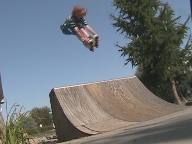 Three trucker over 1/4 pipe