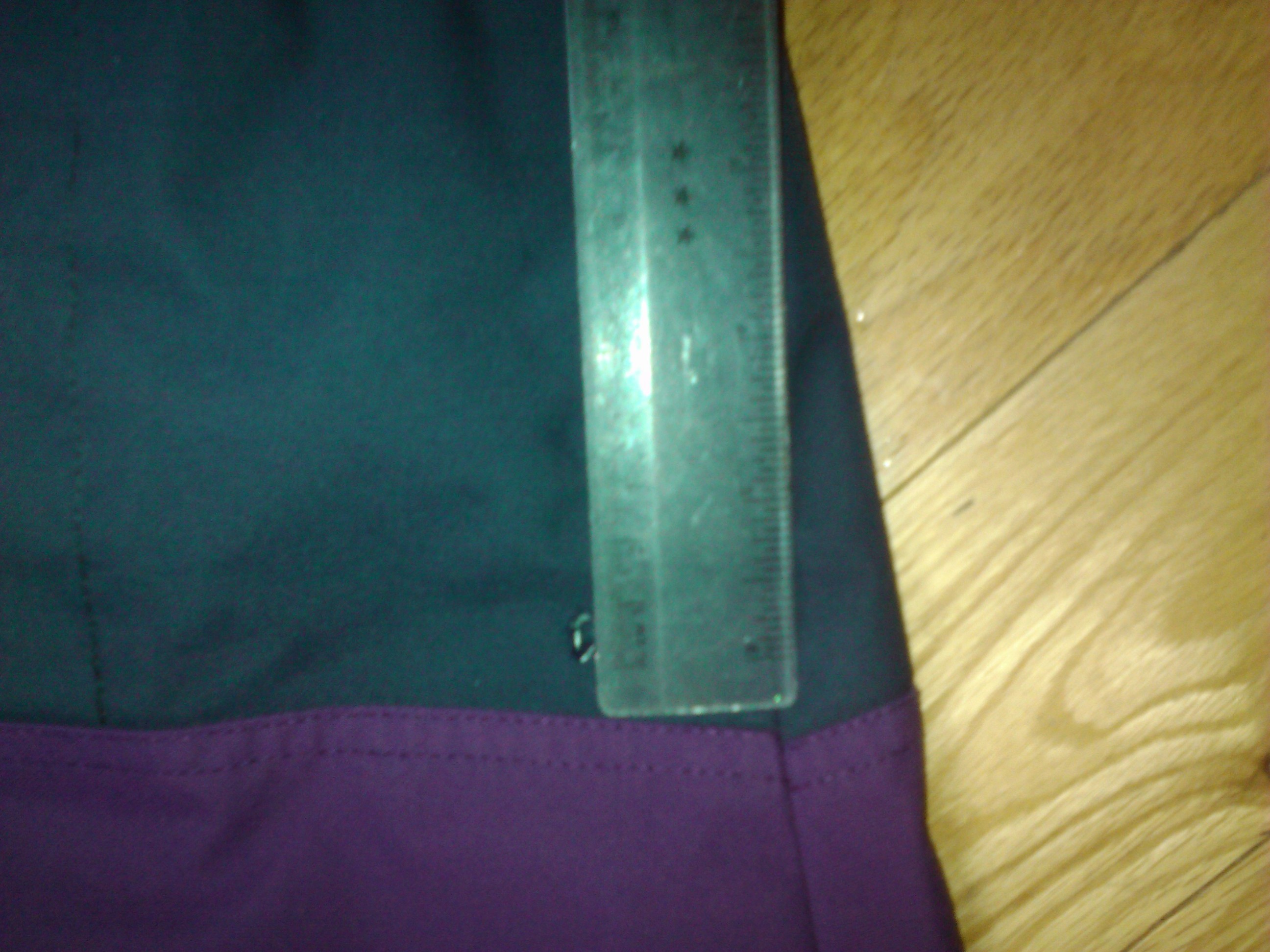 Tiny hole under left arm