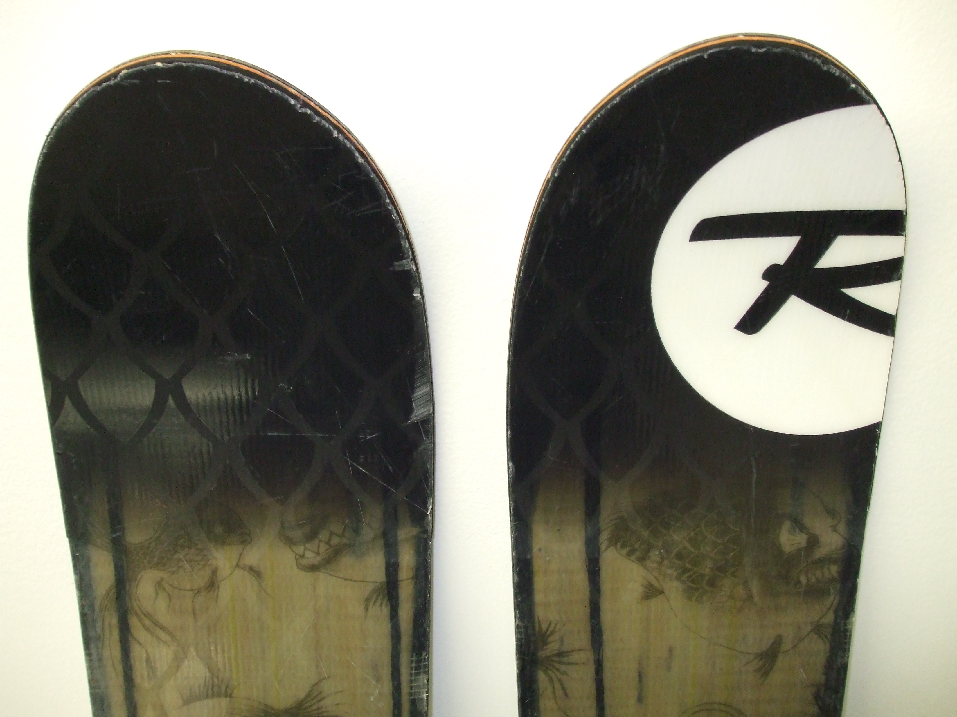 Tips of skis- some minor scratches from chair lift