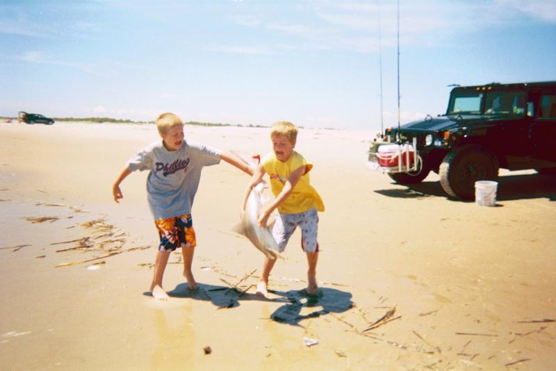 Tough guy scared of a little shark...