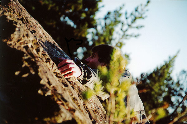 Trav pretending to rock climb