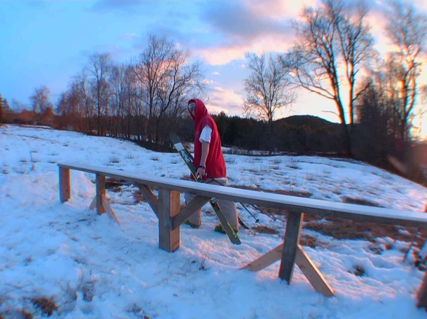 travis hiking his rails in the sunset