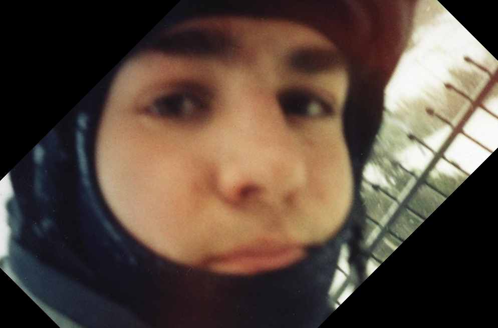 umm I know hes ugly but he what he lacks in looks he gains in style!!