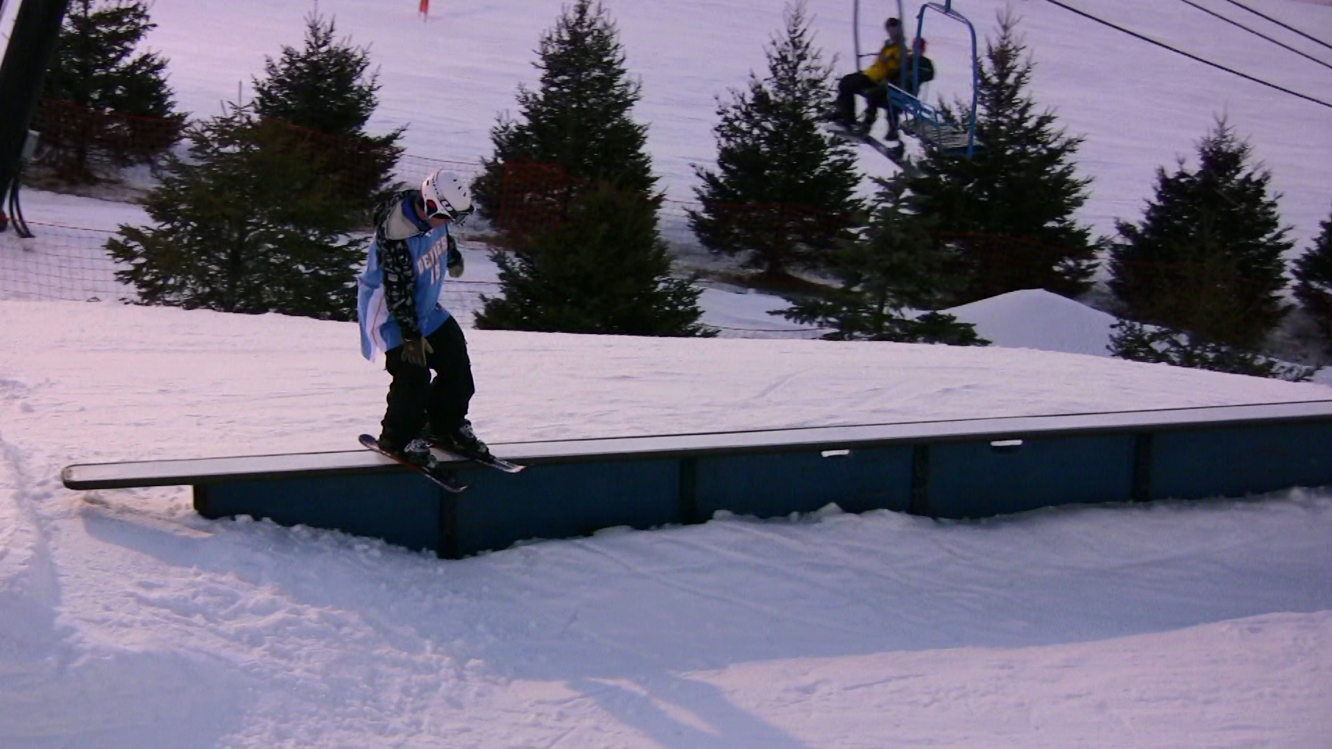Video still: Evan rocks the snowblades