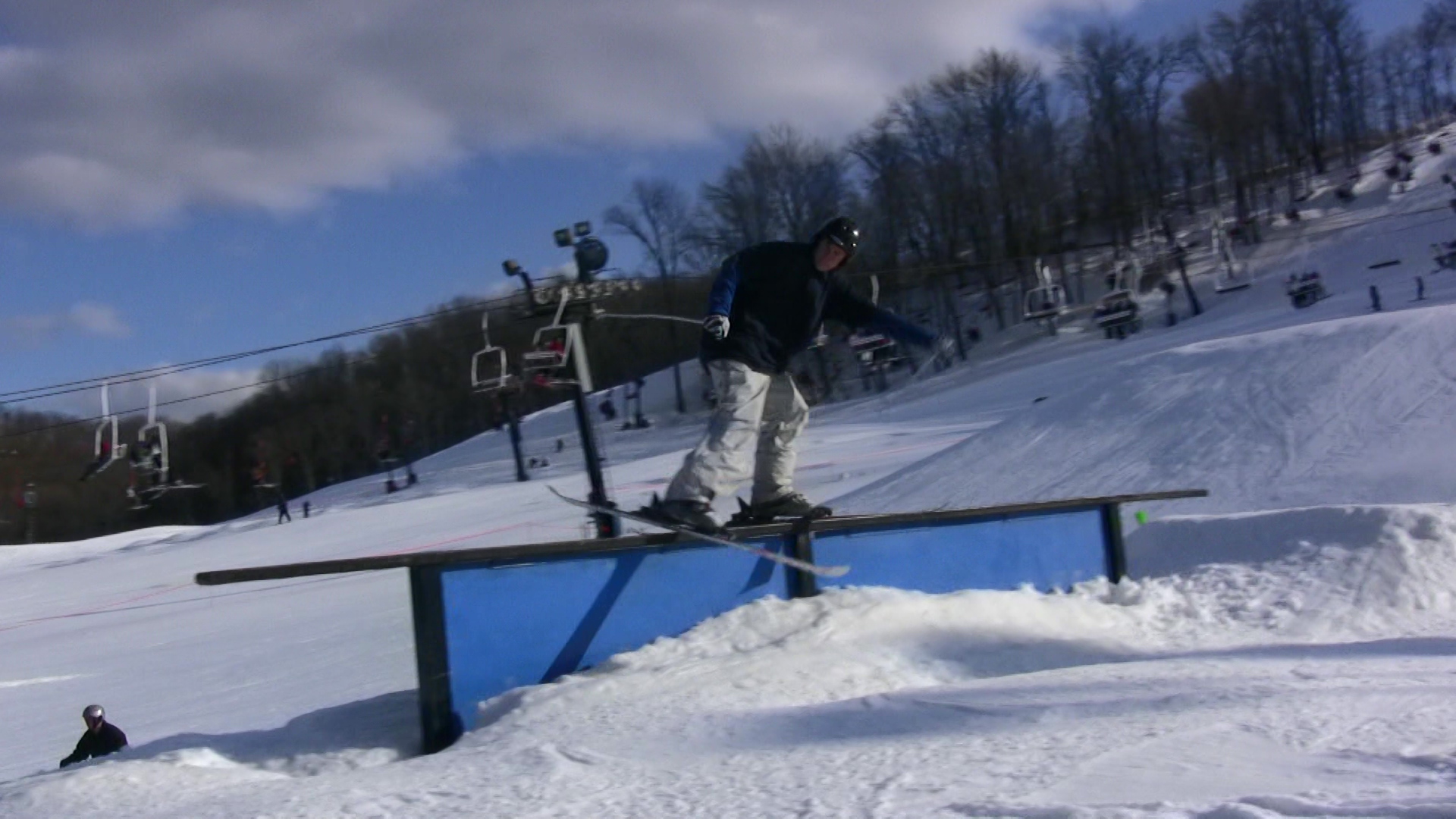 Video still: Sam scissoring the tall-t rail