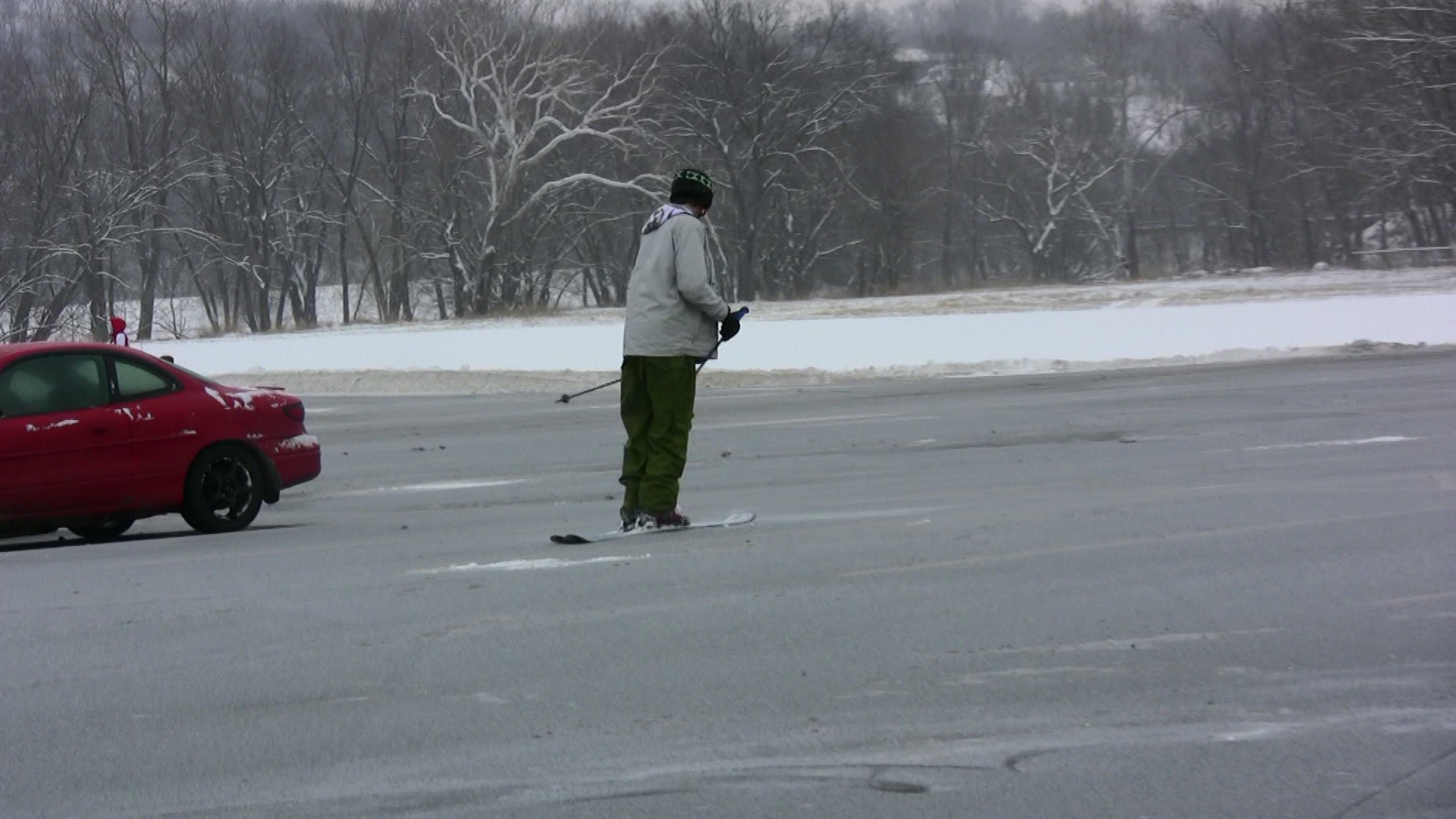 Video still: skiing in the parking lot