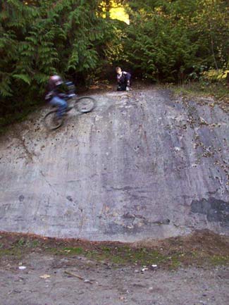 Wallride with mike up top the rock
