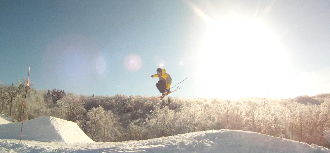 Waving hand near ski, solid grab