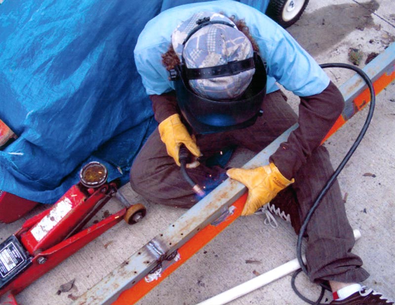 welding new rail to skate.