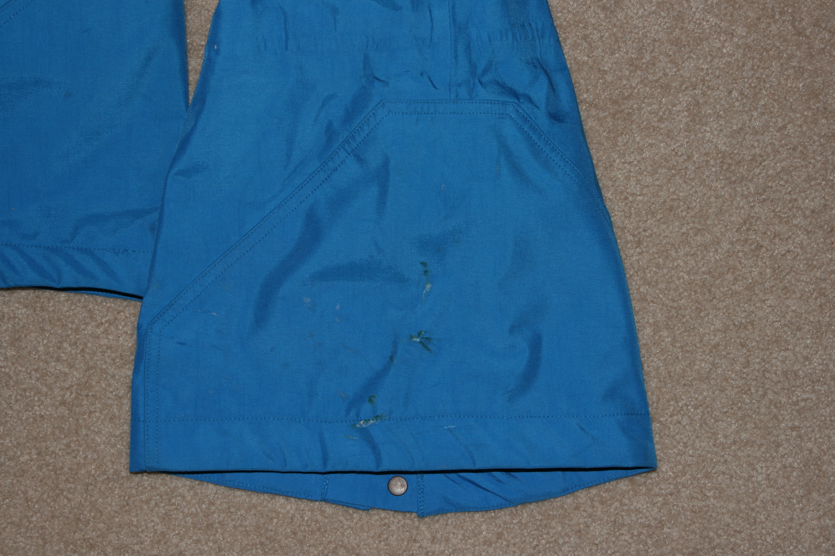 XL Conspiracy suit right ankle.