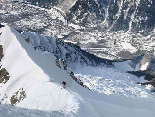 You have to ski out to the left into a steep exit couloir to avoid the large ice cliff